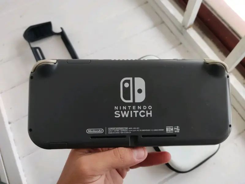 Nintendo switch lite negra con magia - 3