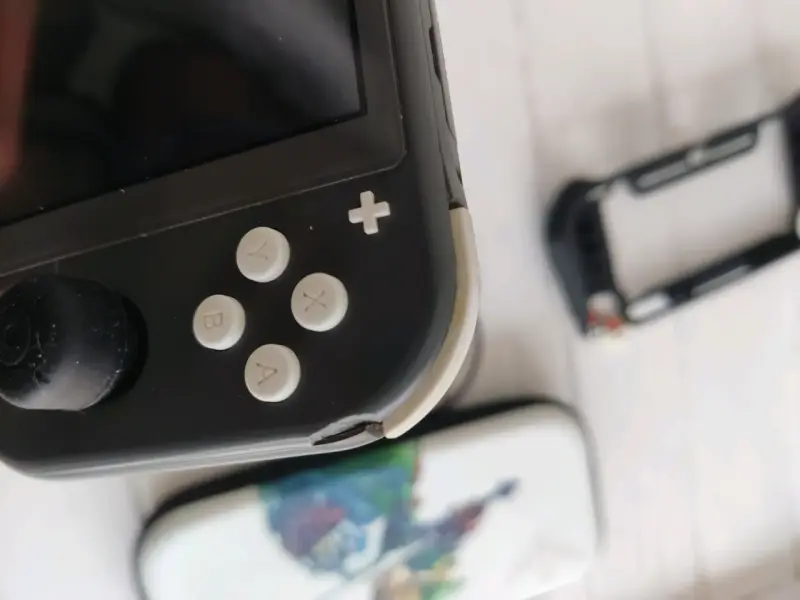 Nintendo switch lite negra con magia - 4