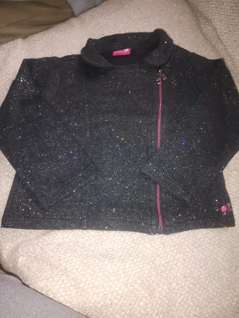 Chaqueta infantil con brillo y cierre asimétrico