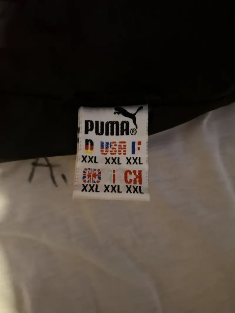 Chaqueta deportiva Puma azul y negra - 3
