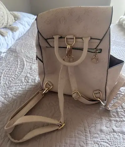 Mochila de cuero blanca con logo LV - miniatura 2