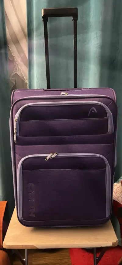 Maleta de viaje morada con ruedas - miniatura 2