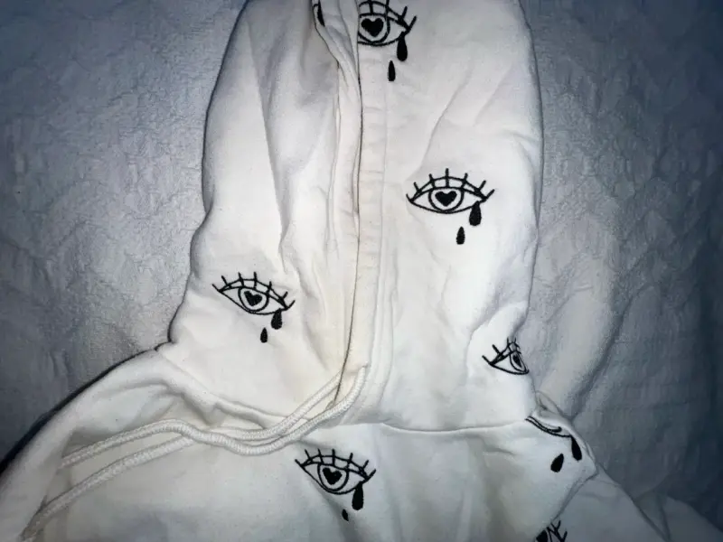 Polerón blanco con estampado de ojos - 2