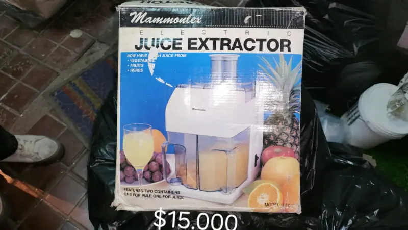 Extractor de jugo eléctrico Mammonlex