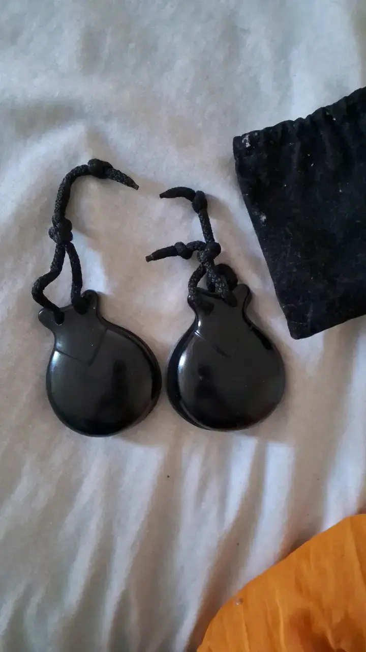 Castañuelas negras con bolsa de transporte