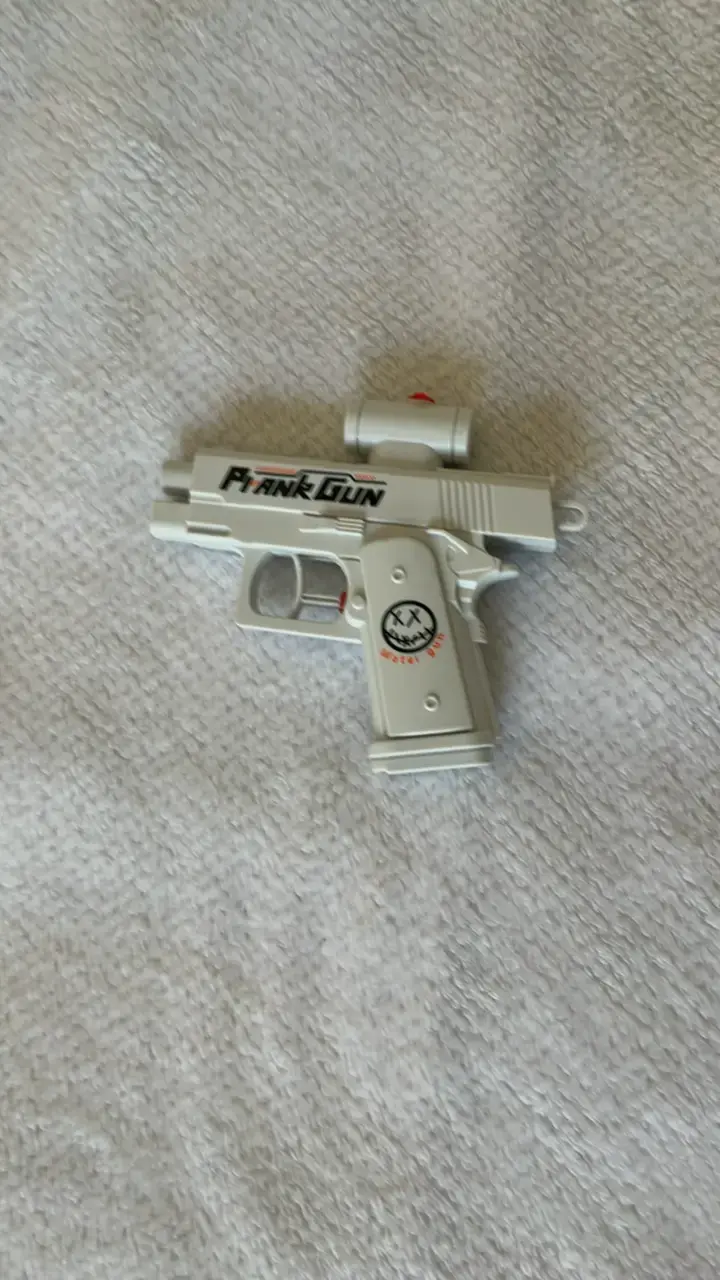 Pistola de juguete Prank Gun blanca