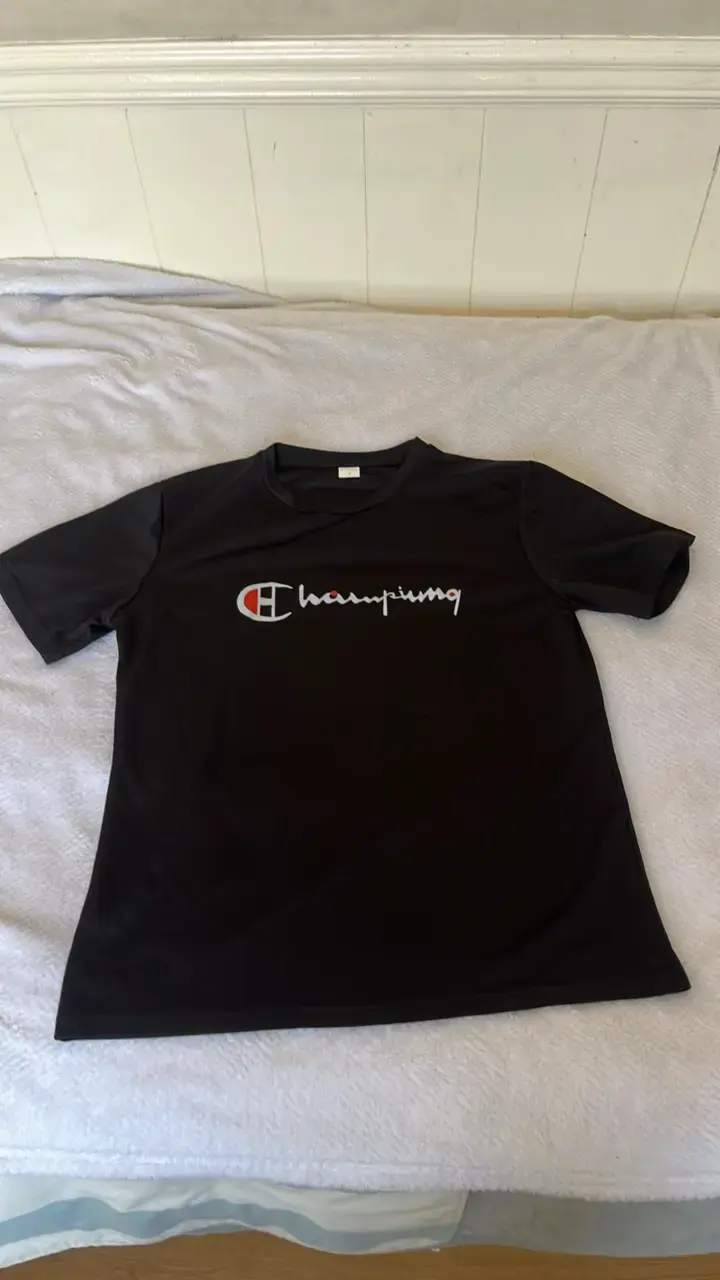 Polera negra Champions - 1