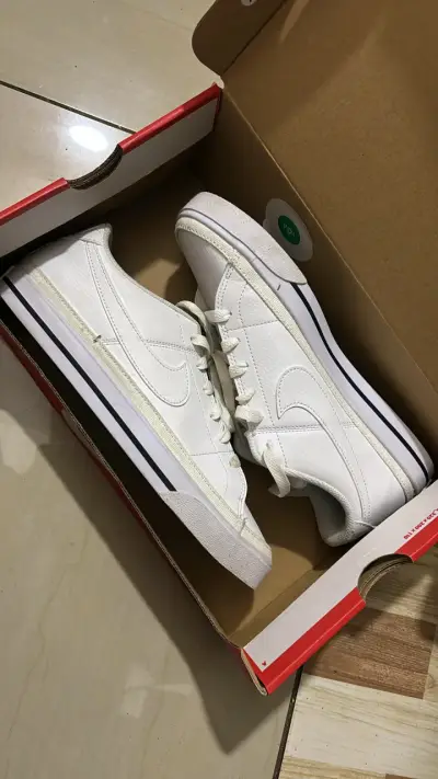 Zapatillas deportivas blancas de cuero - miniatura 1