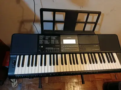 Teclado Casio CT-X800 con soporte - miniatura 1