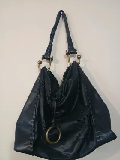 Bolso de cuero bordado - miniatura 1