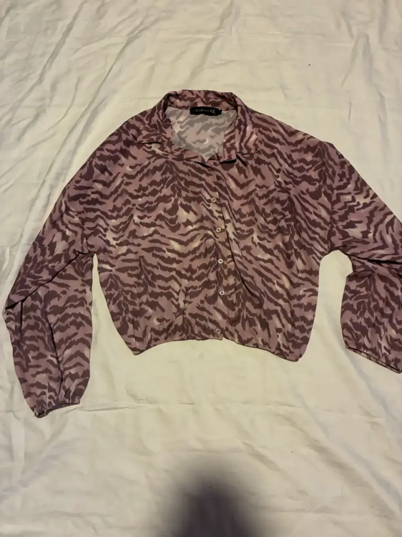 Blusa animal print manga larga - 1
