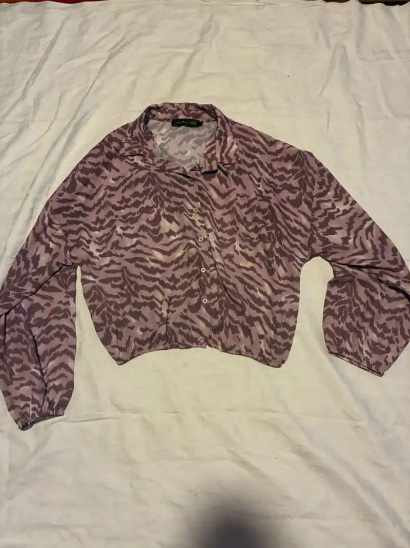 Blusa animal print manga larga - 2