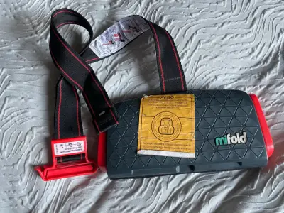 Asiento elevador portátil Mifold negro y rojo - miniatura 1