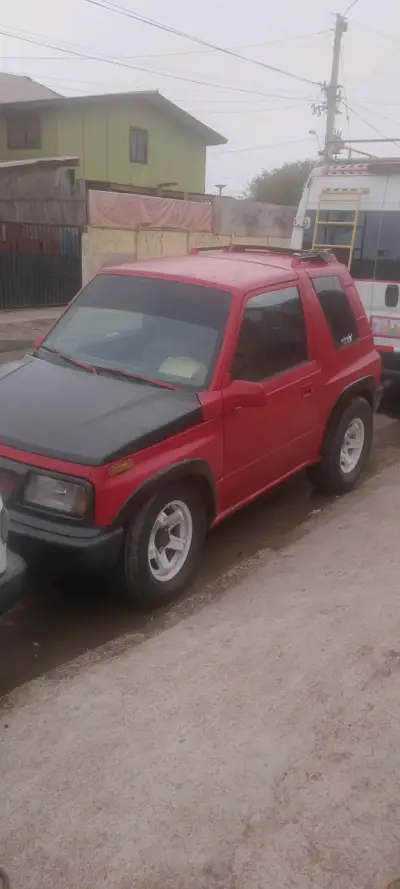 Susuky Vitara   rojo en buen estado - miniatura 1