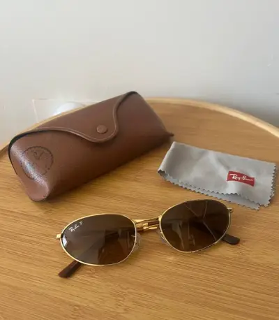Gafas de sol Ray-Ban doradas polarizadas - miniatura 1
