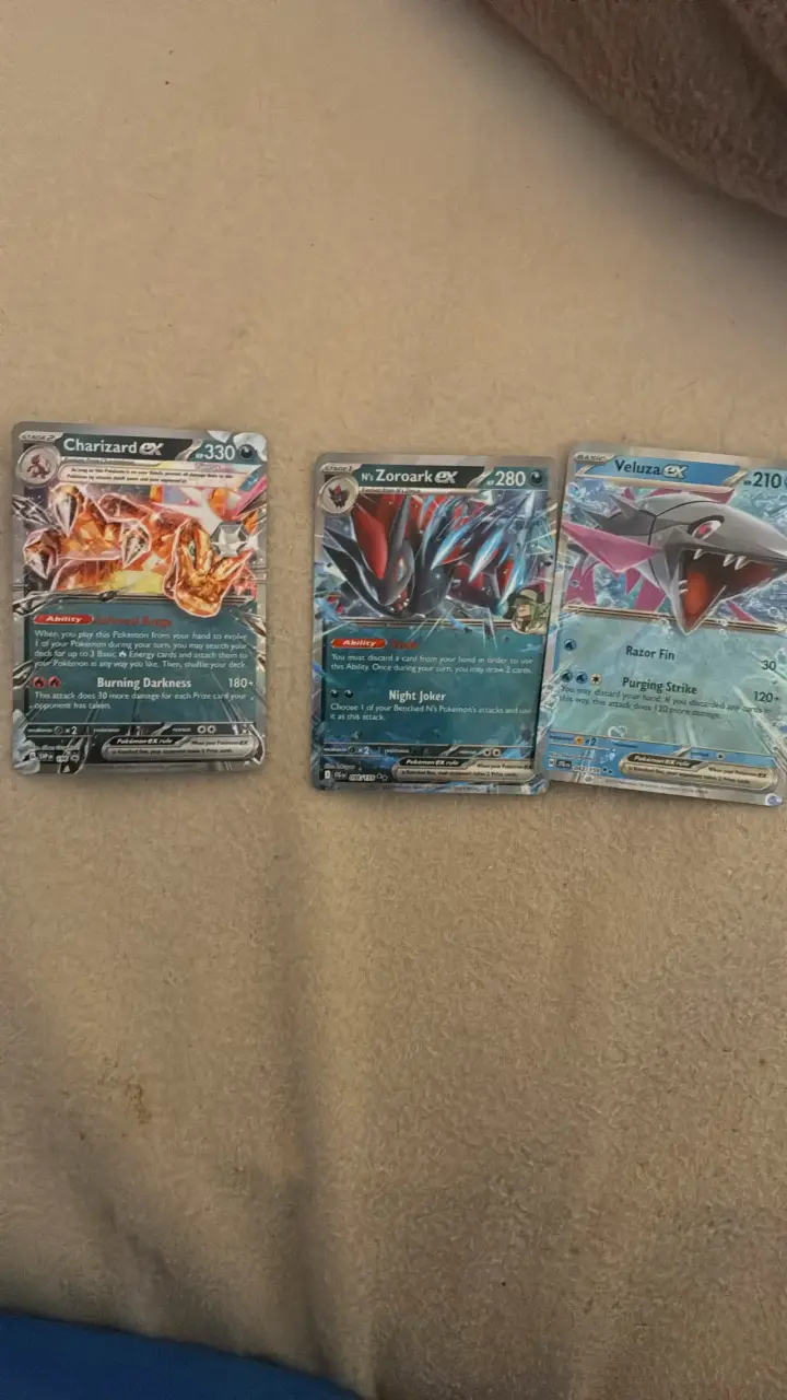 Cartas Pokémon EX Charizard, Zoroark y Veluza