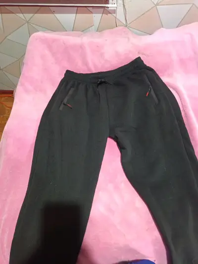 Pantalones deportivos gris con bolsillos - miniatura 2