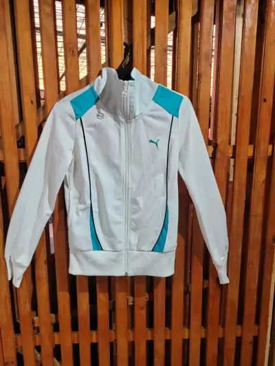 Chaqueta deportiva Puma blanca y celeste - miniatura 1
