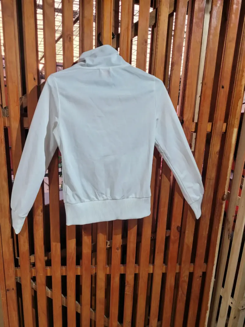Chaqueta deportiva Puma blanca y celeste - 2