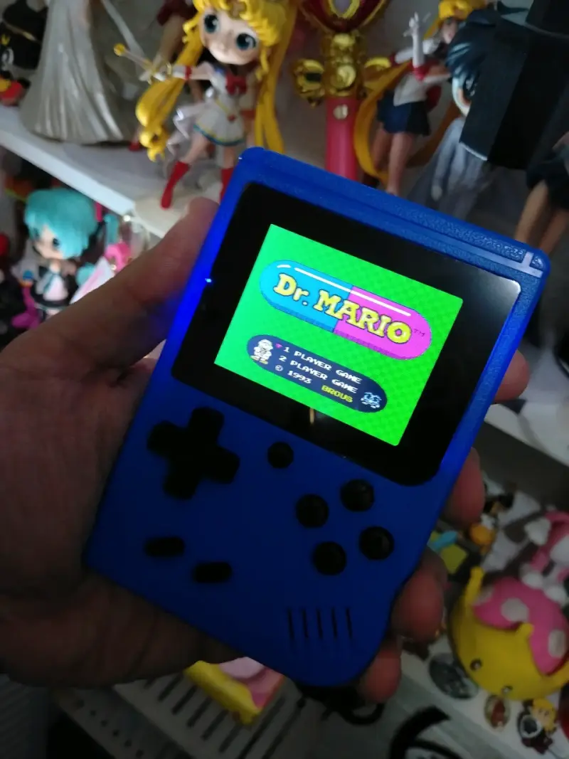 Consola portátil retro azul con 400 juegos - 1