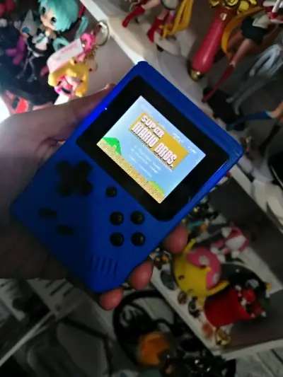 Consola portátil retro azul con 400 juegos - miniatura 4
