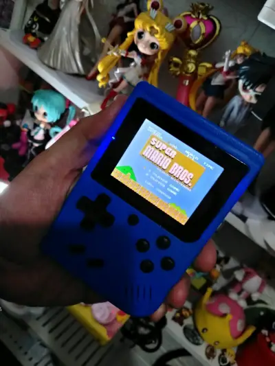 Consola portátil retro azul con 400 juegos - miniatura 5