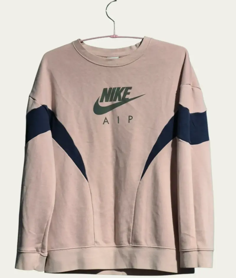 Polerón Nike AIP rosa y azul