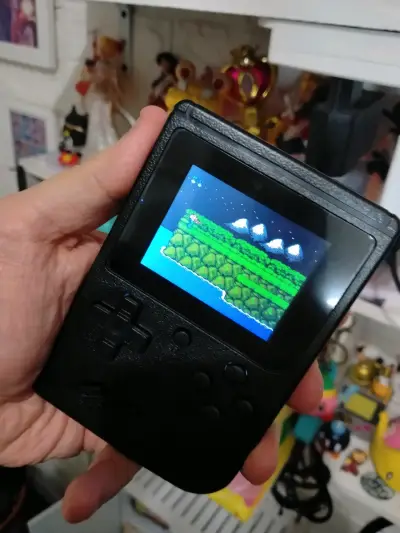 Consola portátil retro con Super Mario Bros - miniatura 3
