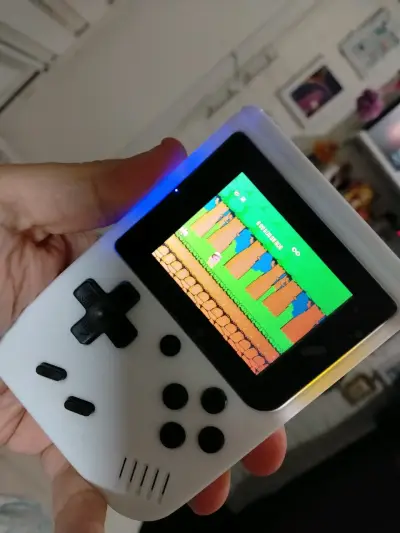 Consola portátil retro con juegos clásicos NES - miniatura 1