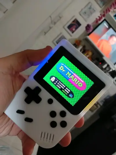 Consola portátil retro con juegos clásicos NES - miniatura 2