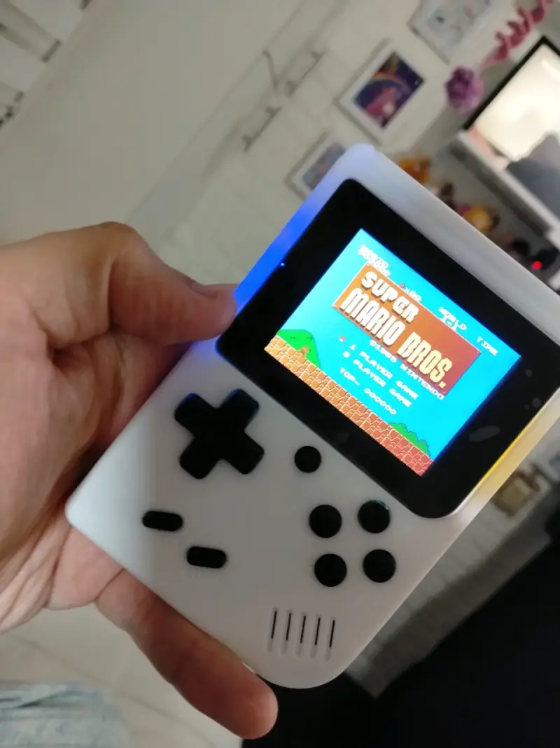 Consola portátil retro con juegos clásicos NES - 3