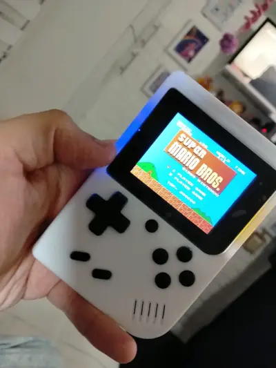 Consola portátil retro con juegos clásicos NES - miniatura 3