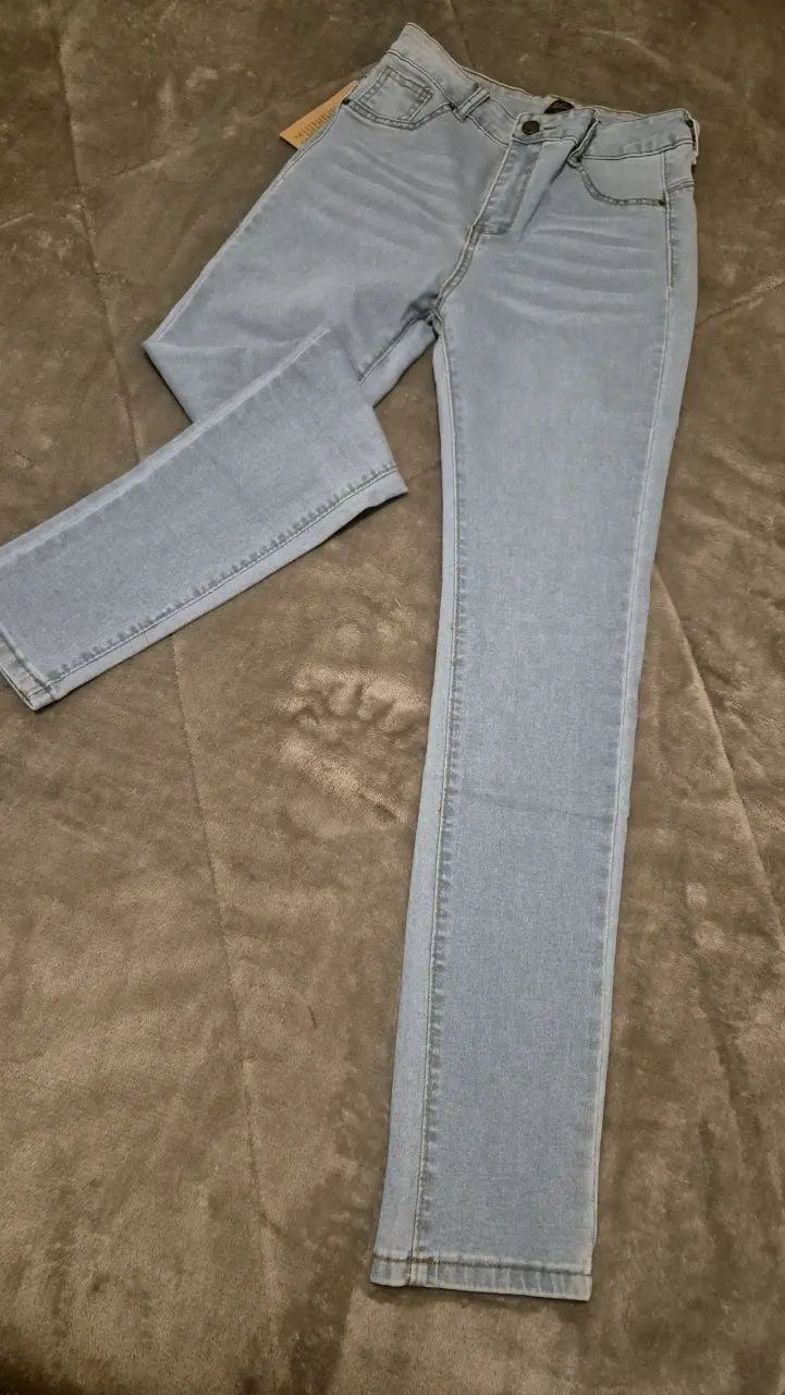 Jeans celestes de mezclilla para mujer - 1