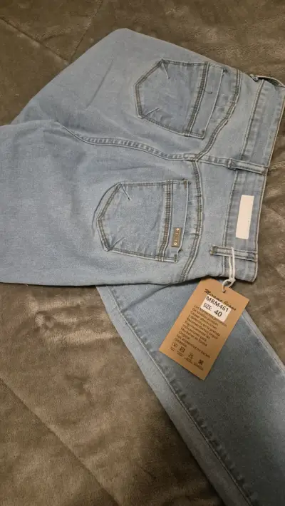 Jeans celestes de mezclilla para mujer - miniatura 3