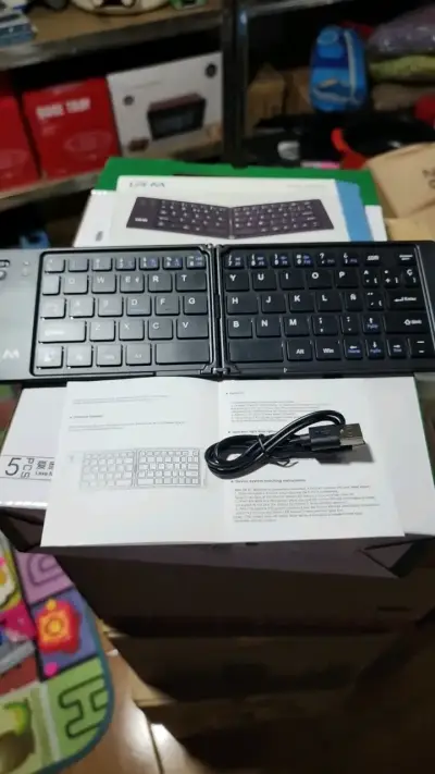 Teclado plegable inalámbrico portátil - miniatura 1