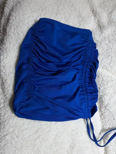 Falda azul fruncida - miniatura 1