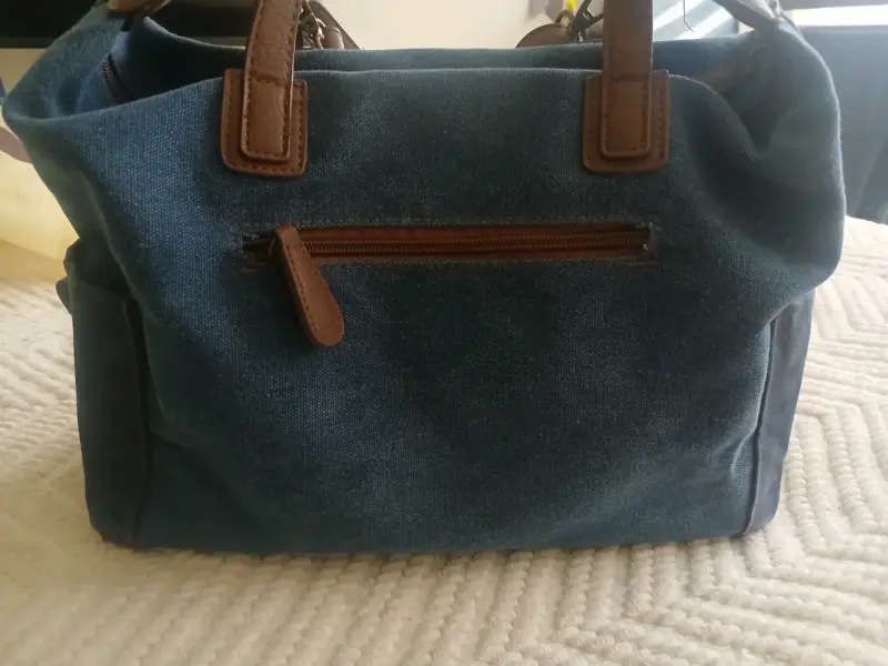 Bolso de tela azul con bordado floral - 3