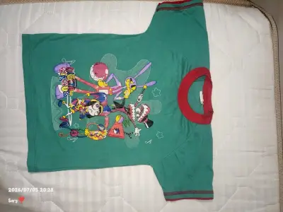 Polera infantil verde con estampado colorido - miniatura 1