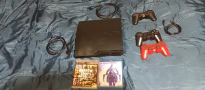 Consola PS3 con dos controles y juegos - miniatura 1