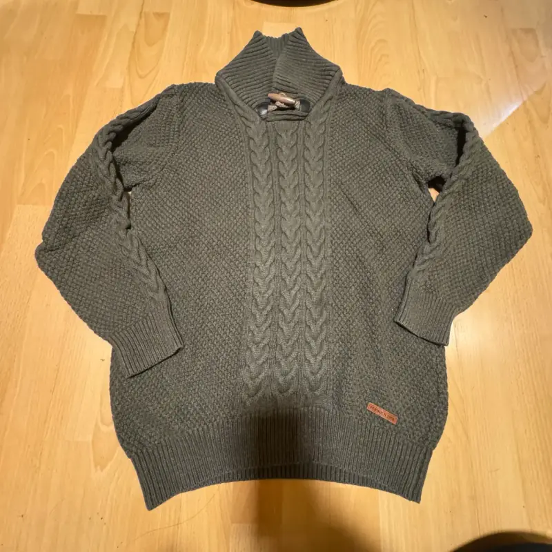 Suéter gris de lana con cuello alto ferrouch - 1