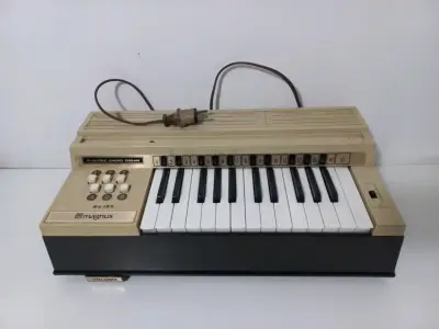 Órgano eléctrico Magnus vintage para reparar - miniatura 1