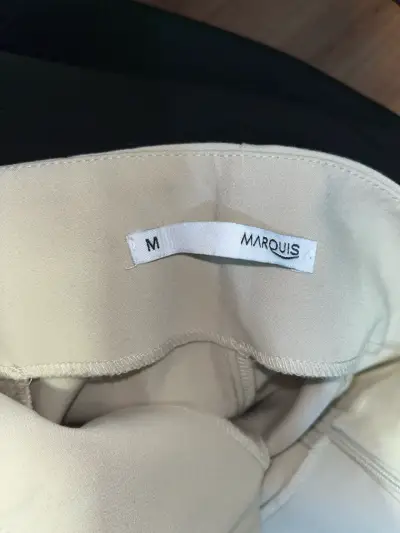 Pantalones beige elegantes para mujer - miniatura 4