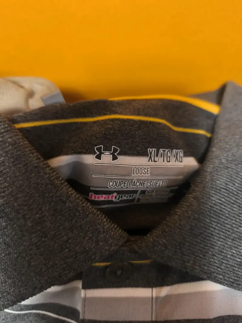 Polera rayada Under Armour gris - 2