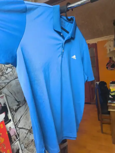 Polera polo azul Adidas para hombre - miniatura 1