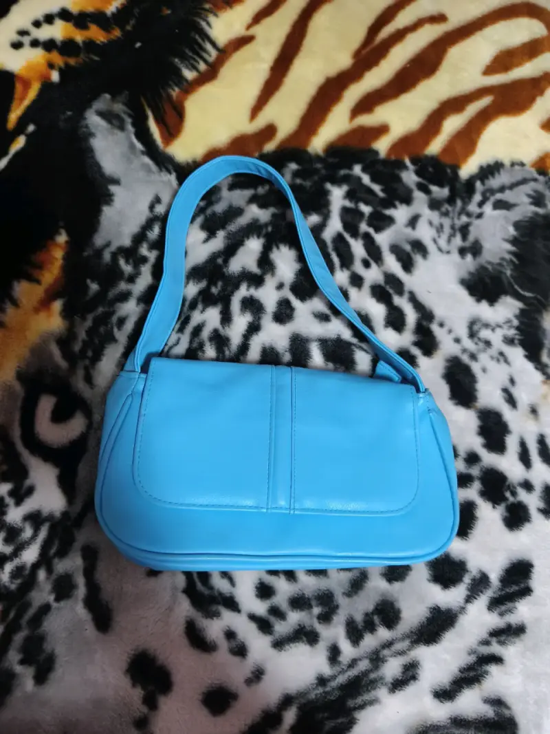 Cartera azul de mano elegante - 2