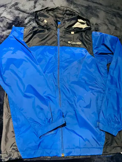 Chaqueta impermeable Columbia azul y negra - miniatura 1