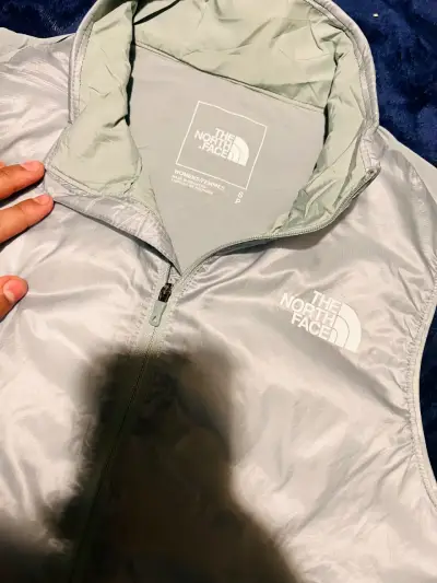 Chaleco cortaviento The North Face gris - miniatura 2