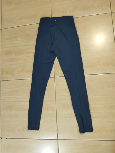 Leggings deportivos azul oscuro con bolsillos - miniatura 1