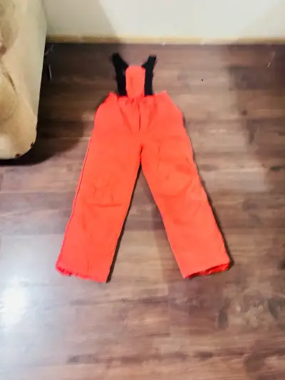 Pantalones de nieve naranjas para invierno - miniatura 1