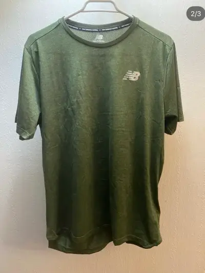 Polera deportiva New Balance verde - miniatura 1